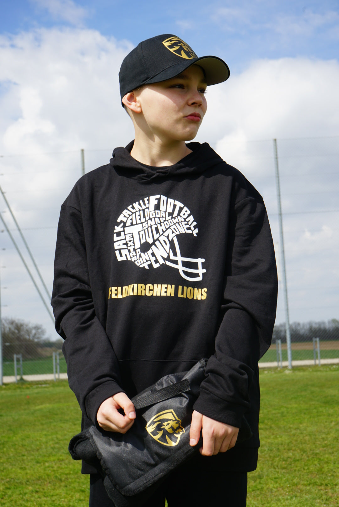 Hoddie Feldkirchen Lions Fanwear "FOOTBALL HELMET WORDS" Erwachsenen/Kindergrößen